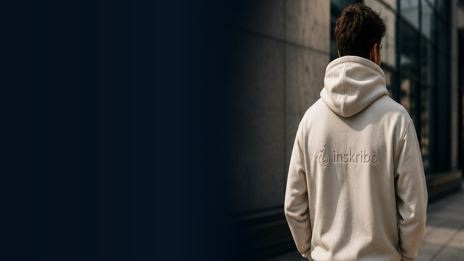 Person wearing a branded Inskribo hoodie